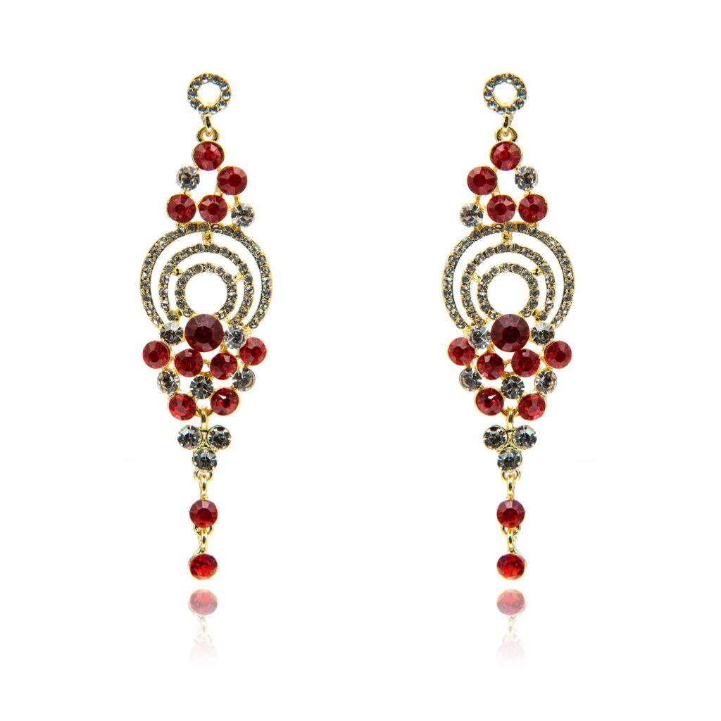Pair of ruby diamond earrings isolated on white