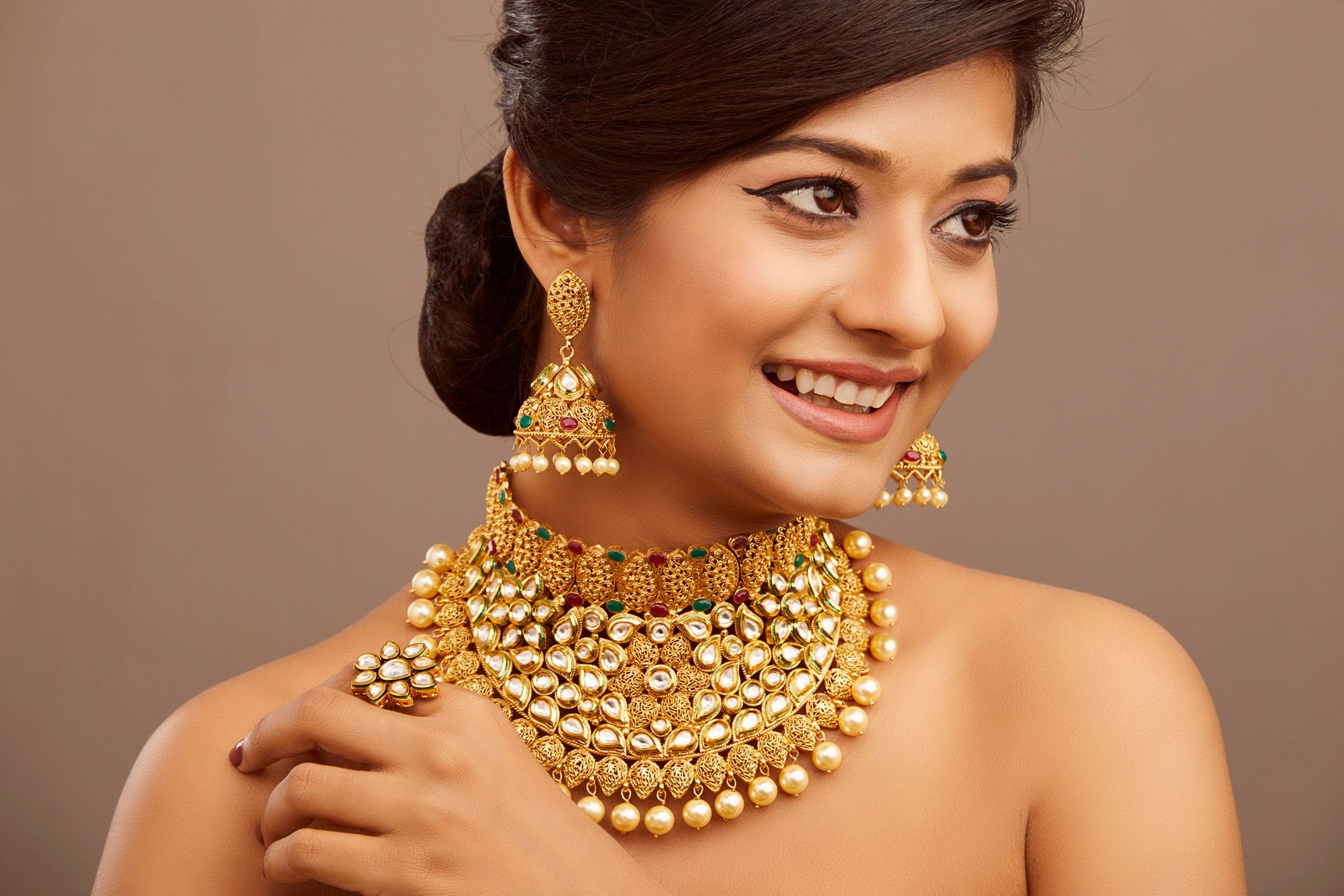 Bride wearing handcrafted Indian jewelry